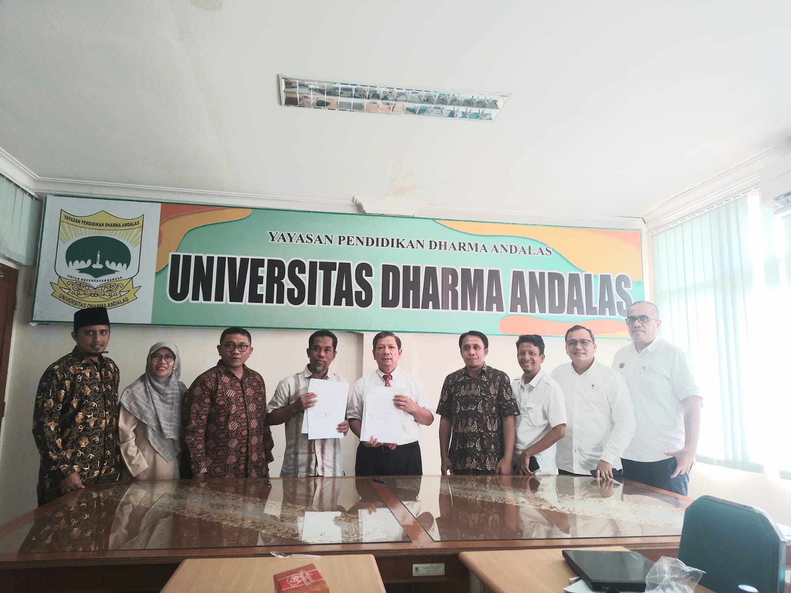 Breaking Ground in Educational Collaboration: Universitas Dharma Andalas and IDBC Join Forces through MoU Signing